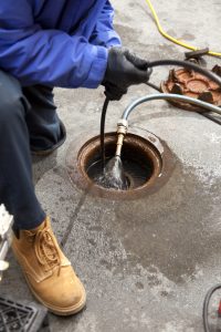 Plumber video inspecting a sewer line